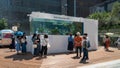 Sony aquarium infront of Ginza Sony Park with tropical fish and people watching them, Tokyo, Japan Royalty Free Stock Photo