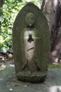 Tokyo, Japan - Buddha statue in the garden of the Nezu museum