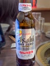 A close up to an Asahi Super Dry 0.0 Non Alcoholic Bottle