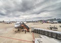 Airbus from Japanese low-cost airline boarding passengers on the apron of the Narita airport.