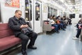 TOKYO, JAPAN - FEBRUARY 19, 2018: Tokyo Subway Metro Station with Sleeping people and travelers Royalty Free Stock Photo