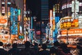 Tokyo, Japan - Jan 11, 2019: Crowded people and car traffic at Kabukicho area, entertainment nightlife zone and red-light district