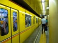 Tokyo, Japan - Jan 2, 2016: Unidentified people waiting to take the Yamanote train in Tokyo, Japan. The railway system Royalty Free Stock Photo