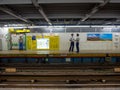 Tokyo, Japan - Jan 2, 2016: Unidentified police officers waiting inside of Yamanote train station in Tokyo Royalty Free Stock Photo