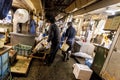 Tokyo, Japan - January 15, 2010: Early morning at Fish Market. Vendor cutting tuna at Tsukiji Fish Market