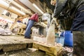 Tokyo, Japan - January 15, 2010: Early morning at Fish Market. Vendors cutting tuna at Tsukiji Fish Market