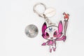 Someity Mascot keychains and commemorative coins of 100 yen for the Tokyo 2020 Olympics Royalty Free Stock Photo