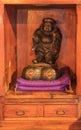 Wooden statue depicting one of the Seven Lucky Gods, Daikokuten, the god of wealth, household and kitchen Royalty Free Stock Photo