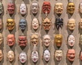 Japanese Noh theater masks depicting faces expressions exhibited in the ART AQUARIUM CAFE of Tokyo.