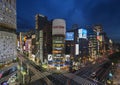 Ginza scramble at night illuminated by the nissan showroom building and sanai dream center tower.