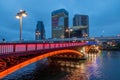 Tokyo, Japan, July 15, 2020: Evening scene of famous landmark Tokyo Azuma Bashi Bridge, Skytree, Asahi Tower, Sumida River. Unique Royalty Free Stock Photo