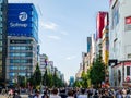 Shoppers and tourists crowd the colorful Akihabara district in Tokyo, famous for its electronics