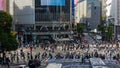 TOKYO, JAPAN - JUNE 21 2023: Large crowds using the famous Shibuya Crossing in a busy shopping area of Tokyo, Japan. Shibuya is