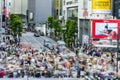 TOKYO, JAPAN - JUNE 21 2023: Long exposure single image of crowds using the famous Shibuya Crossing in Tokyo, Japan