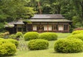 Niwaki shrubs and bonzai trees in front of the Kakuuntei teahouse in Meiji Jingu Inner Garden.