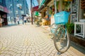 TOKYO, JAPAN JUNE 28 - 2017: Old rusted bicycle in Komachi-dori Street, in Kamakura in Tokyo Japan, a stylish street in