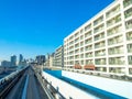 TOKYO, JAPAN JUNE 28 - 2017: Scenery of a train traveling on the elevated rail of Yurikamome Line in Odaiba, Minato Royalty Free Stock Photo