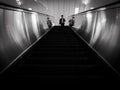 Tokyo, Japan - 17 11 19: A man about to start walking down an escalator