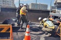 Construction workers fixing the road in Tokyo