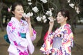 Tokyo,Japan- Mar 27,2019 : two asian women in traditional japanese kimono enjoy sakura festival Royalty Free Stock Photo