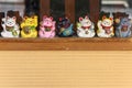 Manekineko lucky cats depicting seven gods of happiness in Yanaka Ginza.