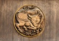 Plum trees and oxen engraving on the wooden door of the Yushima-Tenmangu shrine Royalty Free Stock Photo