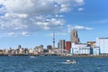 Water buses in Tokyo bay with skyscrapers of Tsukiji and Tokyo Skytree. Royalty Free Stock Photo