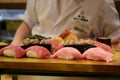 TOKYO, JAPAN: Japanese chef serving Japanese food style set of Sushi in a restaurant