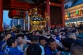 Sanja Matsuri crosses the door at night