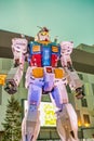 TOKYO, JAPAN - MAY 10, 2016: Unique view of the 59-foot tall life-size replica Unicorn Gundam (RX-0) statue at night in front of