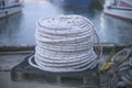 White mooring rope rolled into roll rings at Ishigaki port, Okinawa, Japan Royalty Free Stock Photo