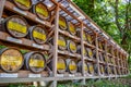 TOKYO, JAPAN: Wooden Barrels stacked of wine at Meiji Shrine in Shibuya, Tokyo