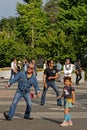 A little girl joins the dancers for fun on Yoyogi Park