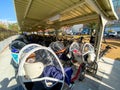 Tokyo, Japan - 18 November 2019: Crowded Bicycles with a cradle for a child at Bicycle parking in Tokyo