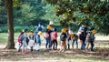 TOKYO, JAPAN - NOVEMBER 7, 2017: A group of japanese children in a city park. Copy space for text.