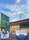 Flag and cardboard of the final sale of 2020 Summer Olympics official shop at Tokyo Sports Square. Royalty Free Stock Photo