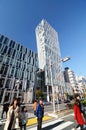 Tokyo, Japan - November 24, 2013: People walk by Futuristic Architecture on Omotesando Street