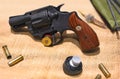 Replica of a revolver Colt Lawman MK Ã¢â¦Â¢ 357 Magnum CGT on a hemp fabric. Royalty Free Stock Photo