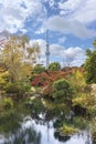 Tokyo Skytree tower reflecting in the pond of the Japanese Mukojima-Hyakkaen Gardens.