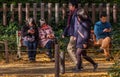 People At Ginkgo Avenue, Tokyo, Japan In Autumn