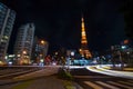 TOKYO, JAPAN - NOVEMBER 28: View of busy street at night with To Royalty Free Stock Photo