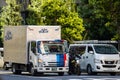 Tokyo, Japan, 26 October 2023: Delivery trucks parked on a street in Tokyo\'s business district