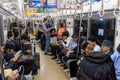 TOKYO, JAPAN - OCTOBER 24, 2019: Full People of Tokyo Train Car. People are traveling from airport to Tokyo City.  Keisei Main Royalty Free Stock Photo