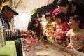 Tokyo, Japan - October 18, 2020 : japanese child girls are playing japanese goldfish scooping game at summer festival in Tokyo, Royalty Free Stock Photo