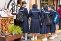 TOKYO, JAPAN - OCTOBER 31, 2017: Japanese schoolgirl on a city street. Close-up. Royalty Free Stock Photo