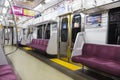 Passenger seats in Japanese metro train with nobody