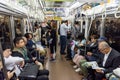 TOKYO, JAPAN - OCTOBER 25, 2019: Tokyo Metro Train and Car Full of People. Going Home after Work Day Royalty Free Stock Photo