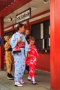 Unidentified foreigner tourist wearing kimono, the national tradition costume of Japan walking at Sensoji temple the famous temple