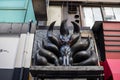 Tokyo, Japan, 26 October 2023: Unique Sculpture Above a Tokyo Shop Entrance