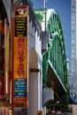 Tokyo, Japan, 26 October 2023: Vertical Banners and Signs on a Tokyo Building Exterior
